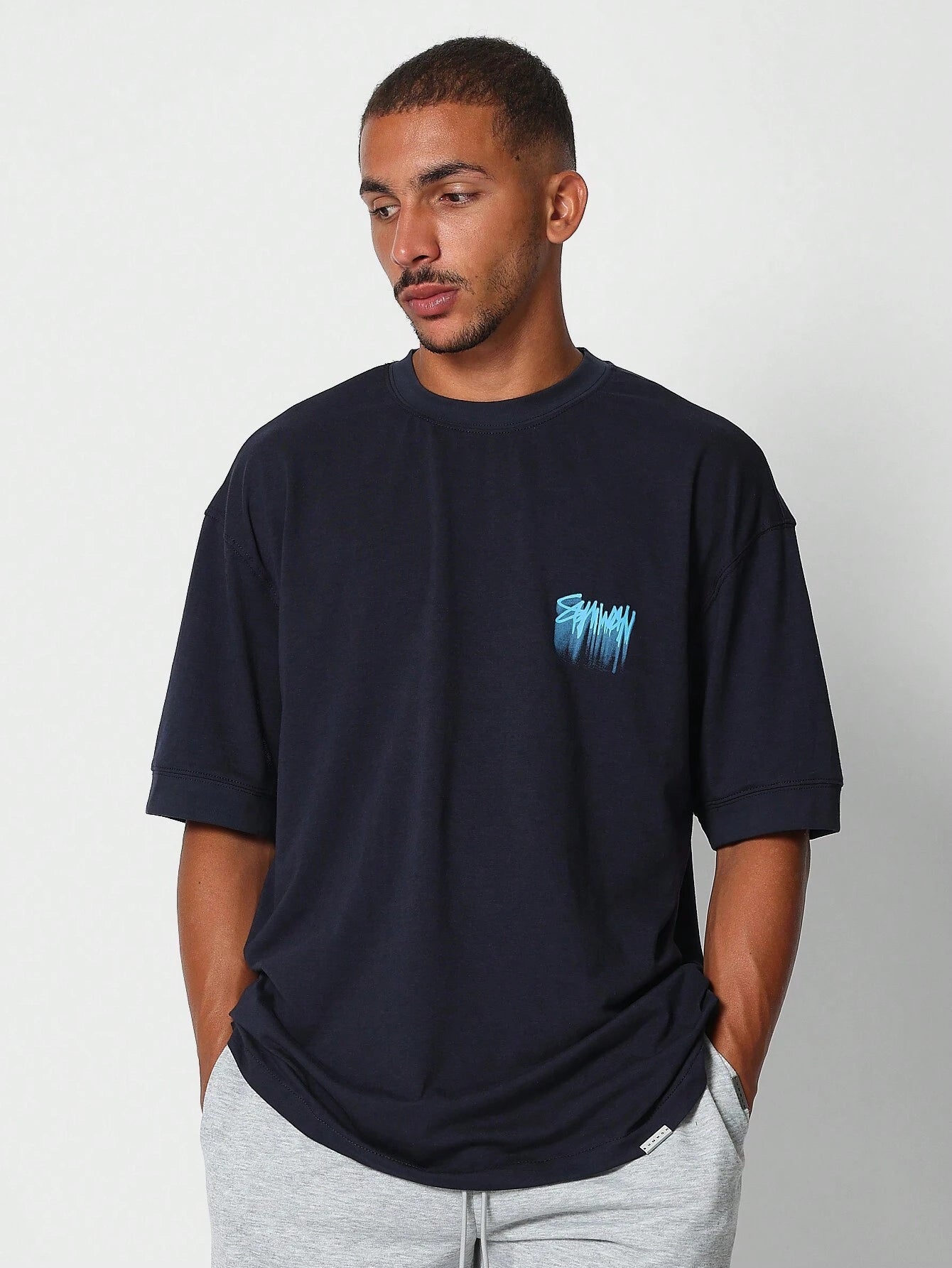 SUMWON Oversized Graffiti T-shirt | T-shirt | Casual herenshirt met kunstzinnige print