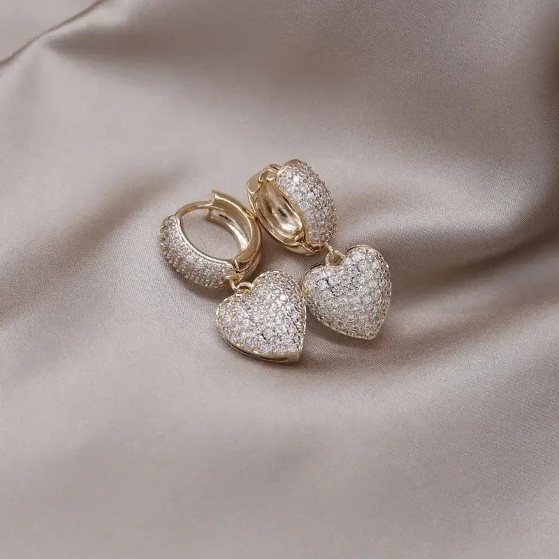 Prachtige Luxe Oorbellen Strik -of Hartvorm met briljantjes!