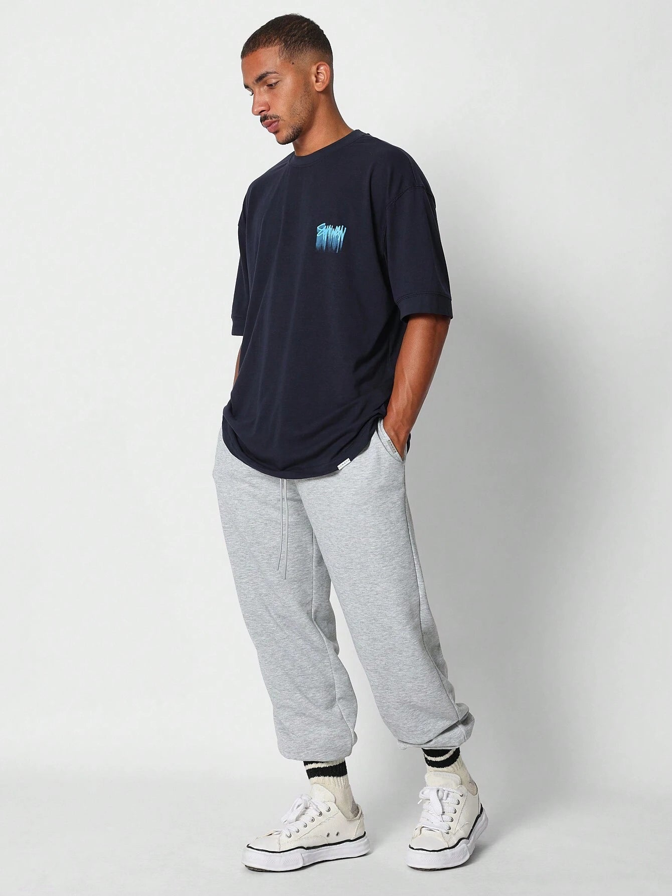 SUMWON Oversized Graffiti T-shirt | T-shirt | Casual herenshirt met kunstzinnige print