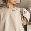 Embrace Hoodie | Te personaliseren met namen op de mouw