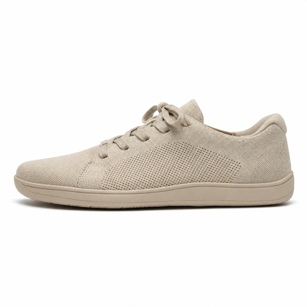 Uniseks barefoot sneaker met mesh bovenwerk, zijaanzicht op witte achtergrond